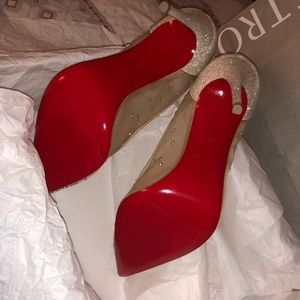 Christian Louboutin pump in sheer